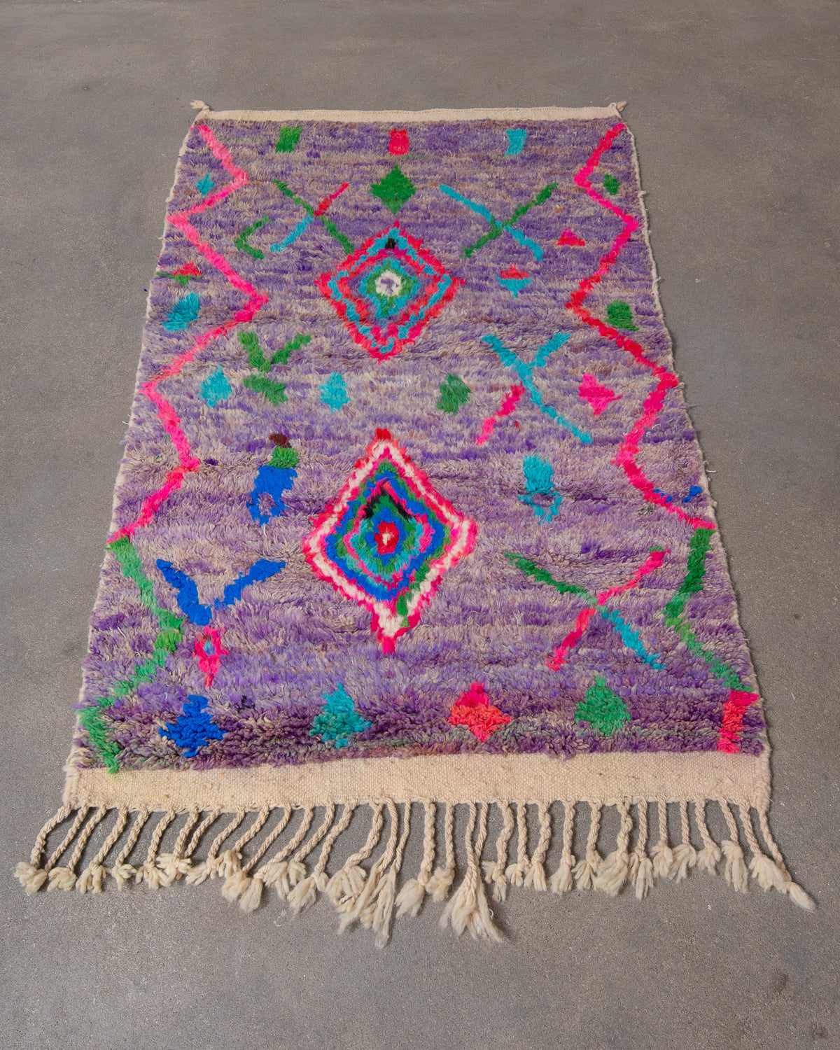 Modern, designer, handcrafted Berber rug from Morocco. Vintage carpet with beautiful colours and patterns and fluffy texture.